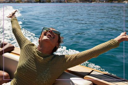 woman on boat so happy