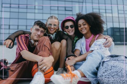 Group of teenagers smiling at the camera